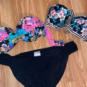 2 bathing suit tops with black bottoms